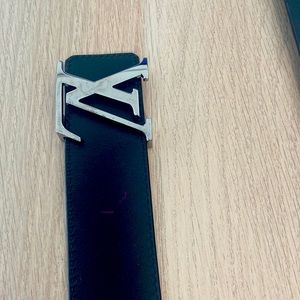 Louis Vuitton leather belt.